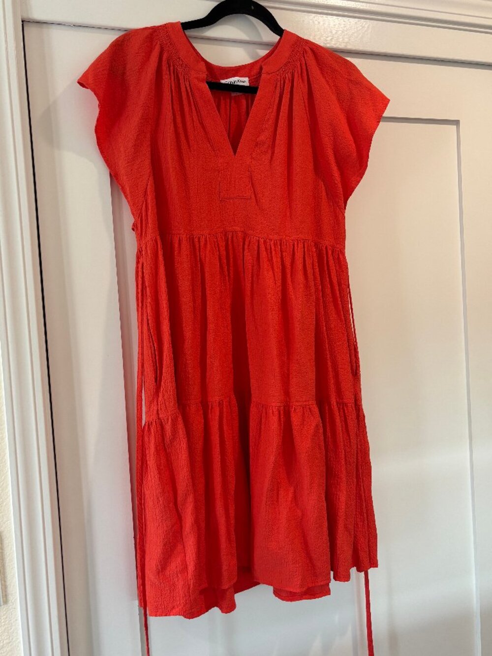 Fun, flirty orange Calvin Klein knee-length dress size 6